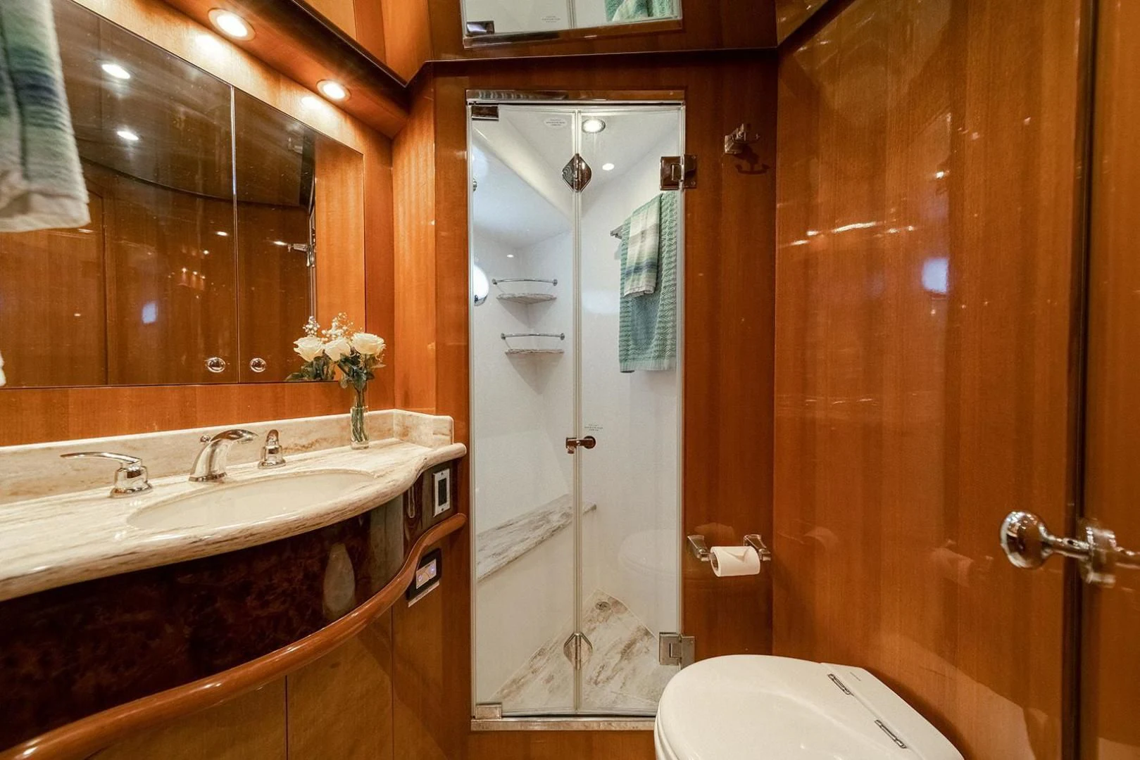 a bathroom with a glass shower aboard DREAM CATCHER Yacht for Sale