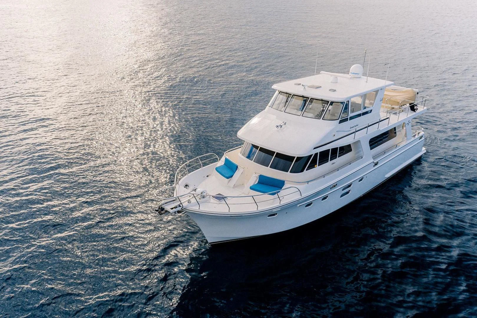 a white boat in the water aboard DREAM CATCHER Yacht for Sale