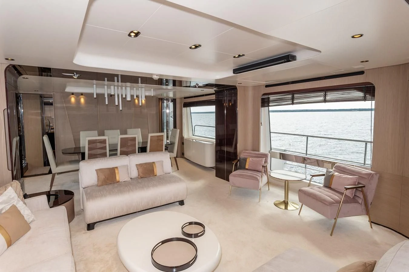 a living room with a large window aboard CLOUDY BAY Yacht for Sale