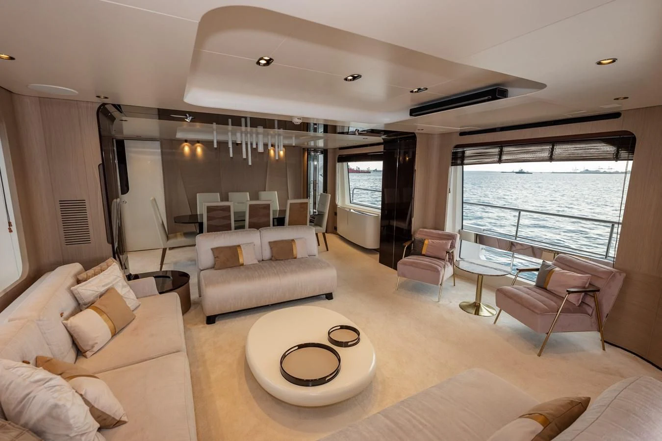 a living room with a large window aboard CLOUDY BAY Yacht for Sale