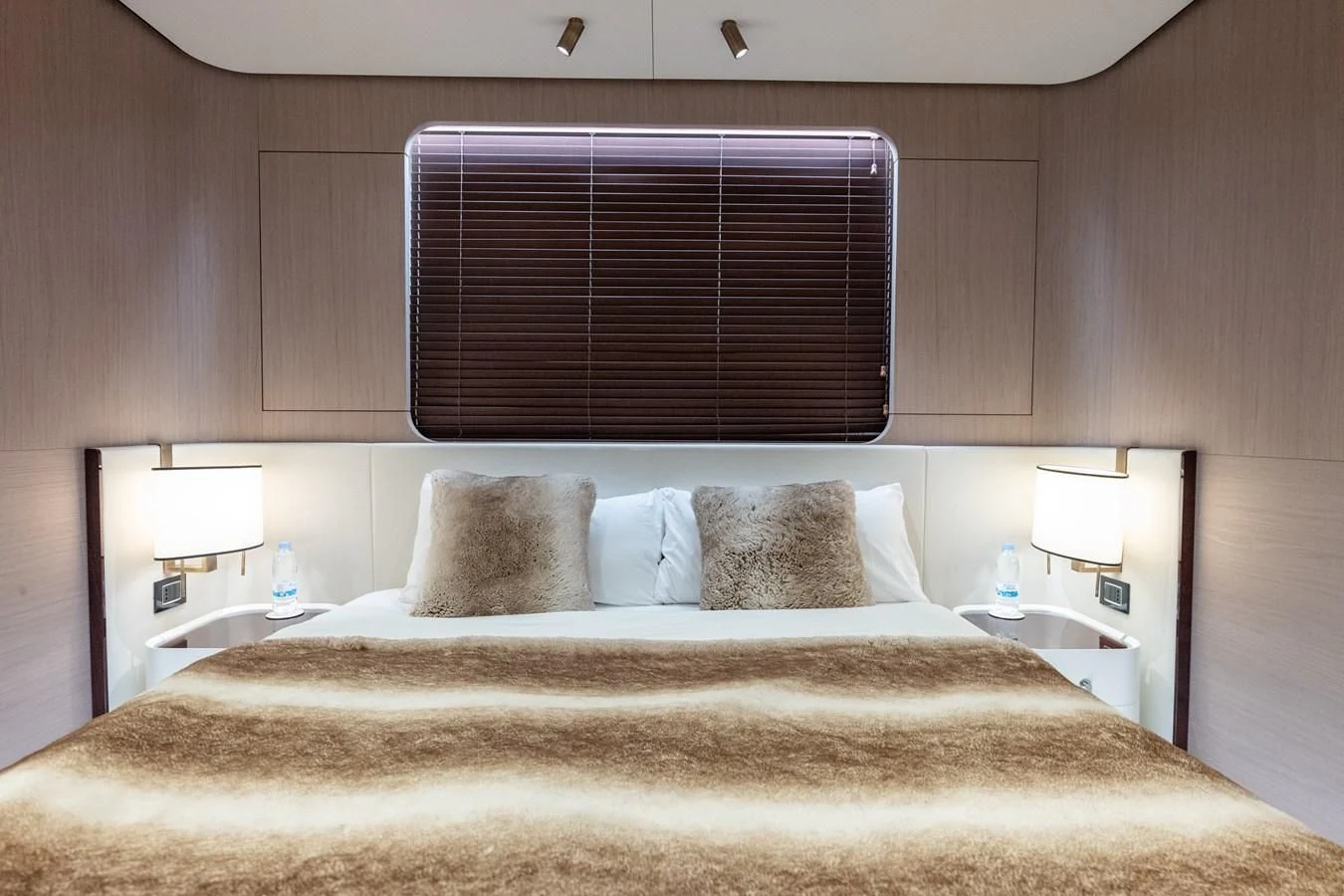 a bed with pillows aboard CLOUDY BAY Yacht for Sale