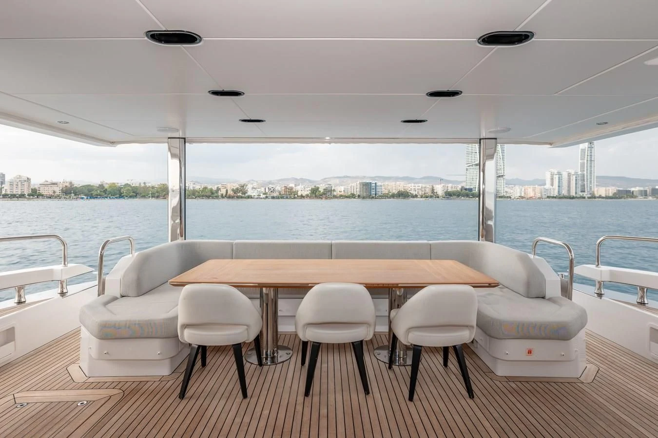 a table and chairs on a boat aboard CLOUDY BAY Yacht for Sale