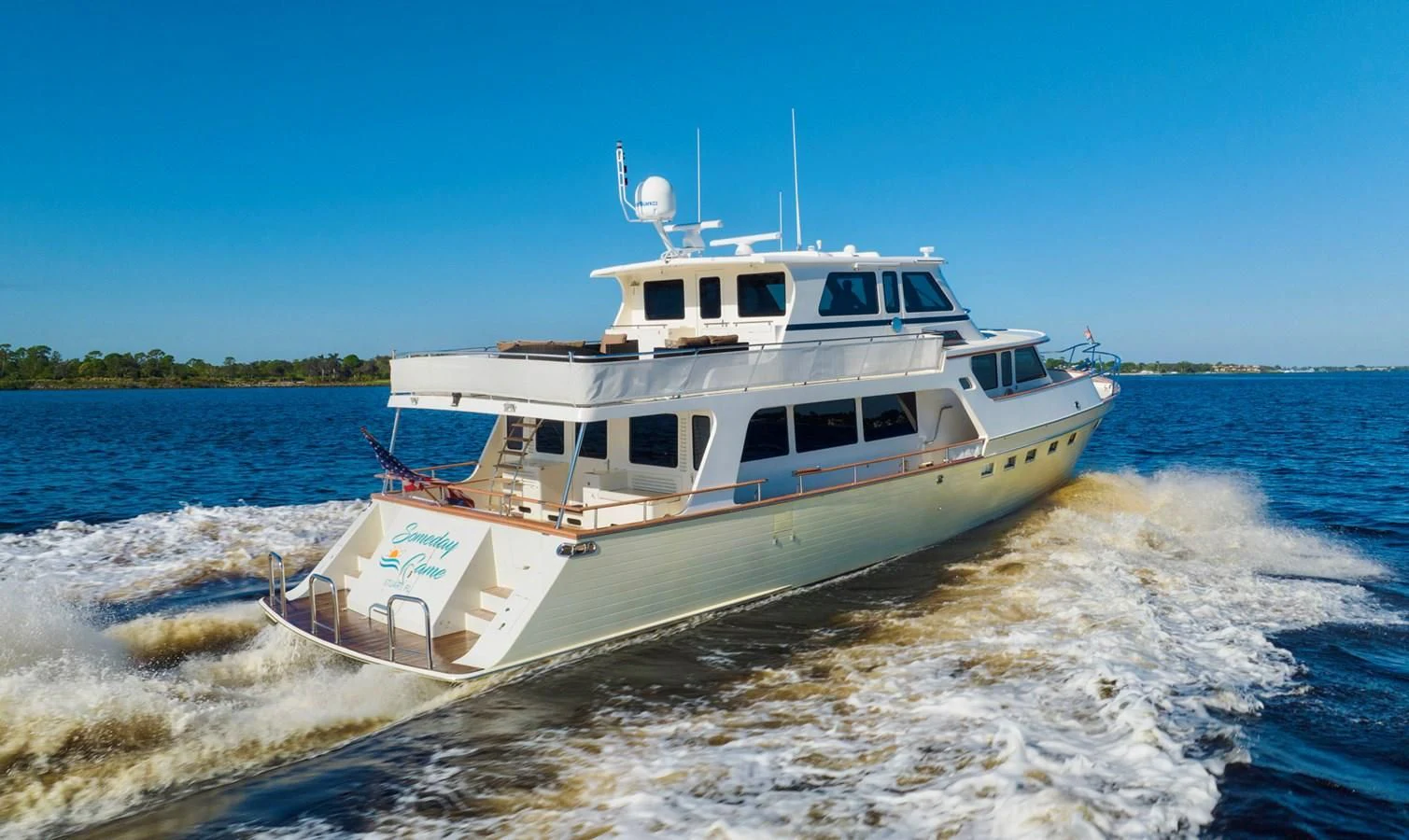 a boat on the water aboard SOMEDAY CAME Yacht for Sale