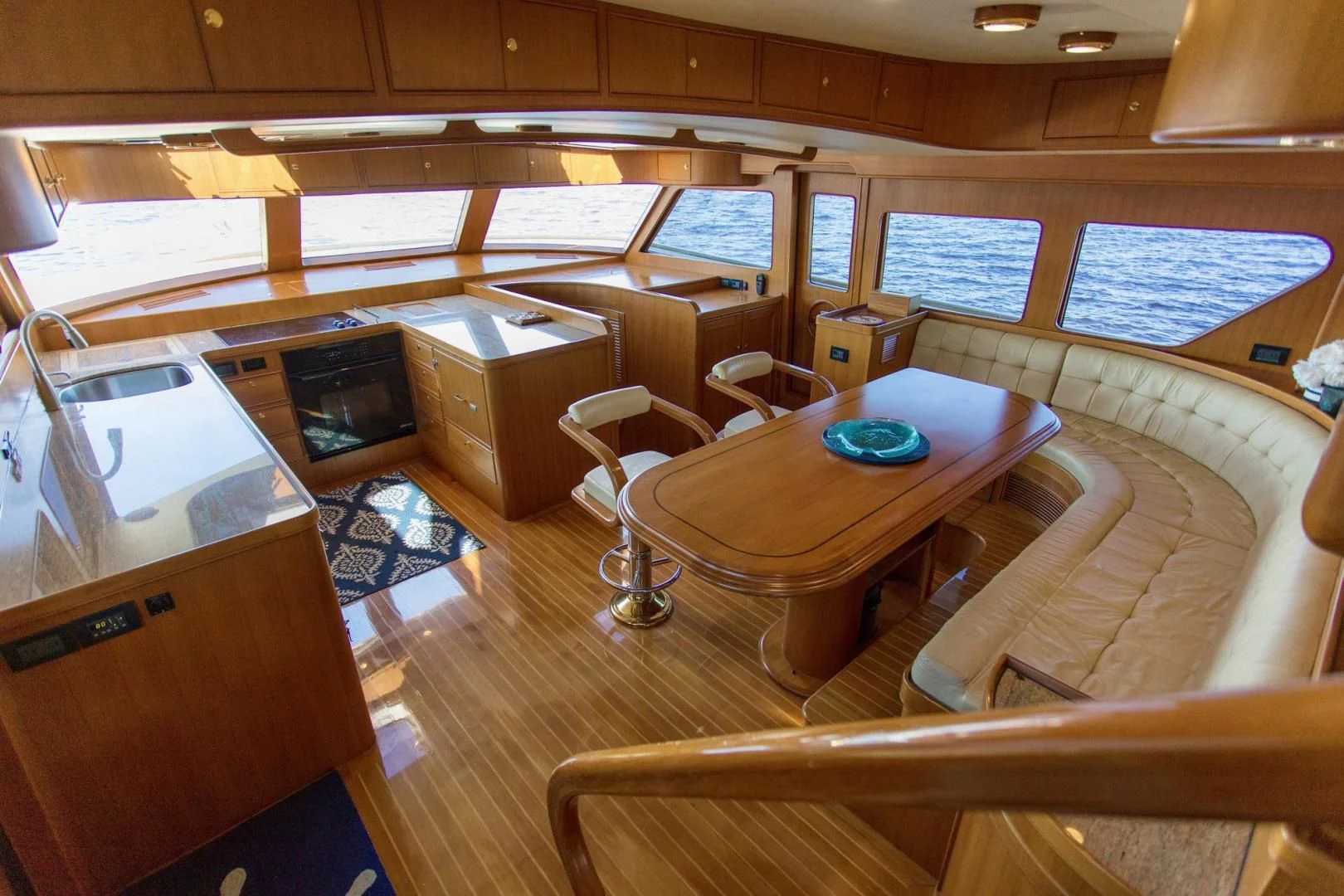 a room with a table and chairs aboard SOMEDAY CAME Yacht for Sale