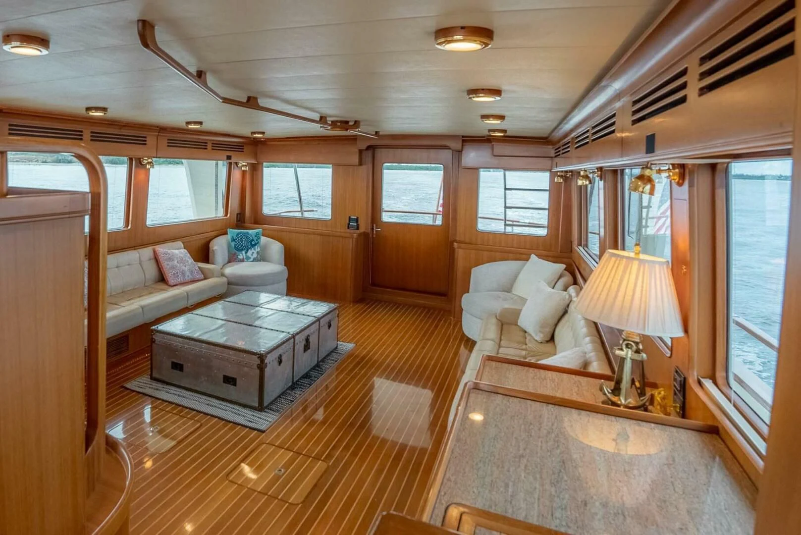 a living room with a couch and a table aboard SOMEDAY CAME Yacht for Sale