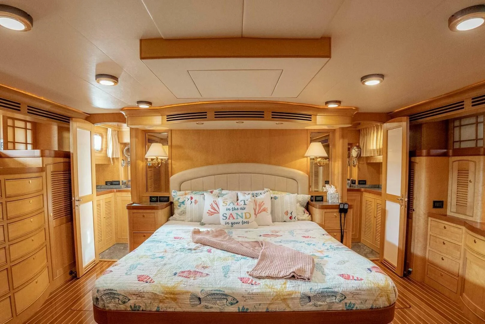 a bedroom with a large bed aboard SOMEDAY CAME Yacht for Sale