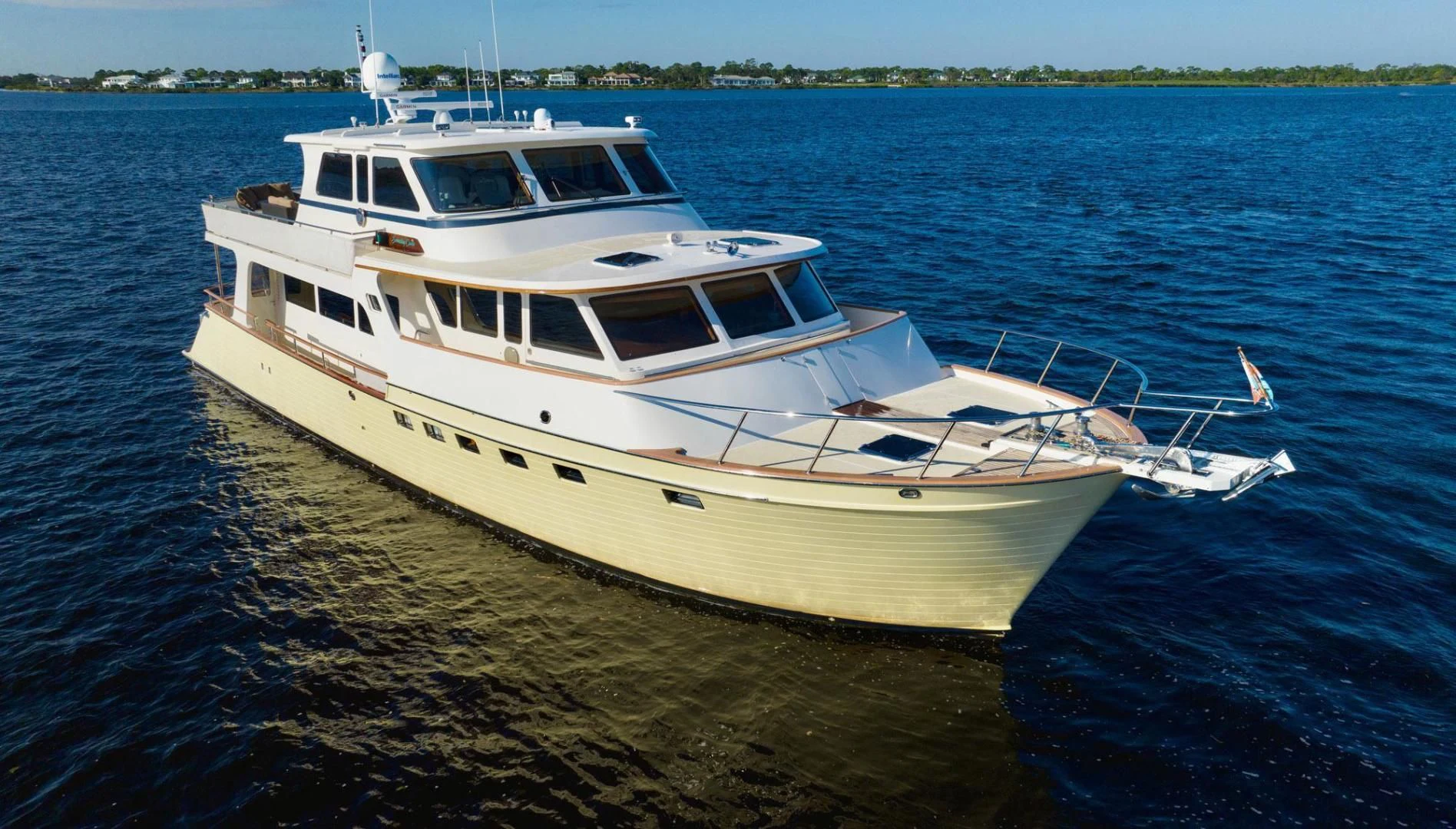 a white boat on the water aboard SOMEDAY CAME Yacht for Sale