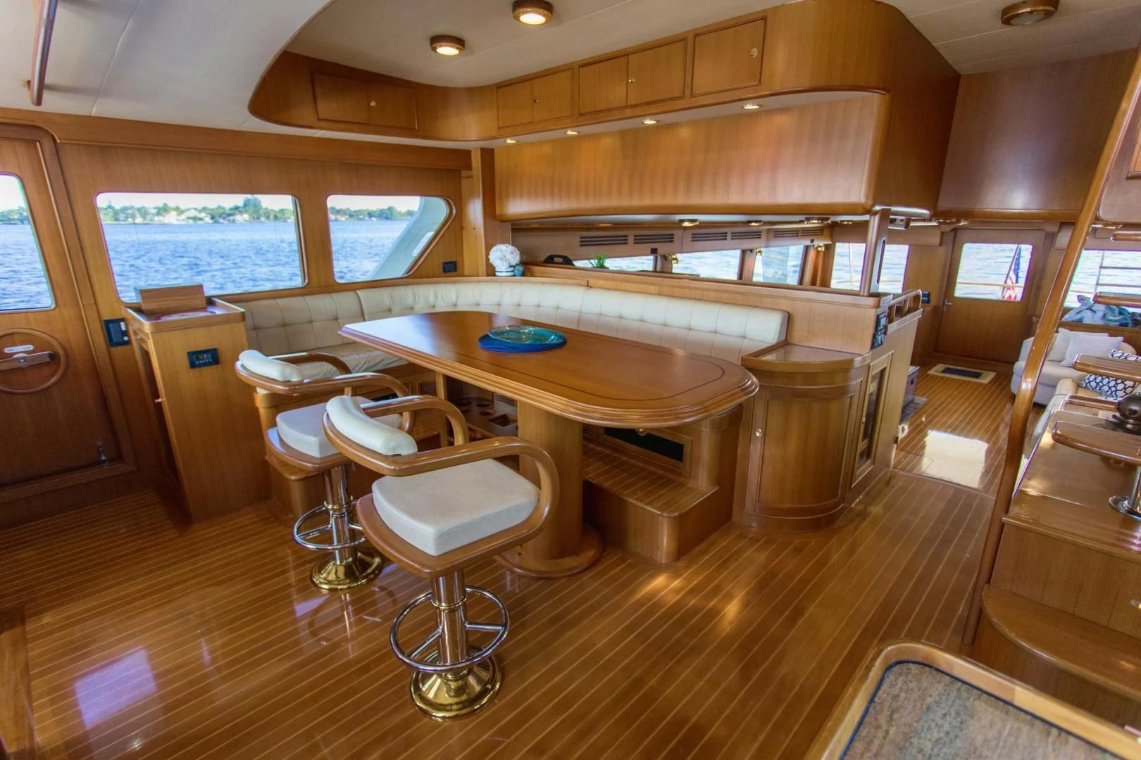 a room with a table and chairs aboard SOMEDAY CAME Yacht for Sale