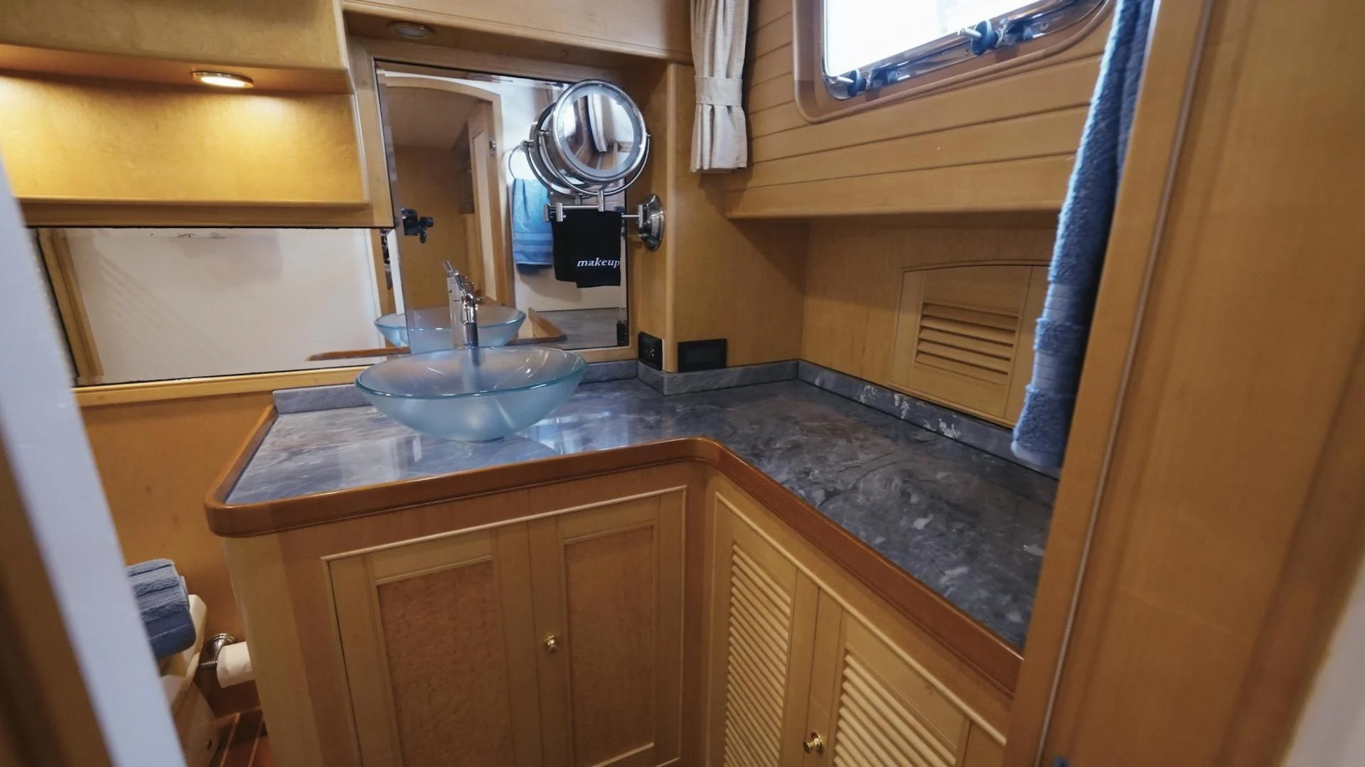 a kitchen with a sink and cabinets aboard SOMEDAY CAME Yacht for Sale
