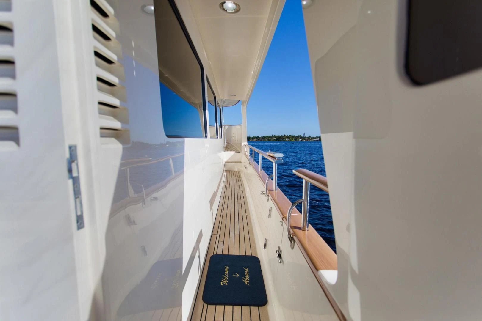 a long wooden walkway on a boat aboard SOMEDAY CAME Yacht for Sale