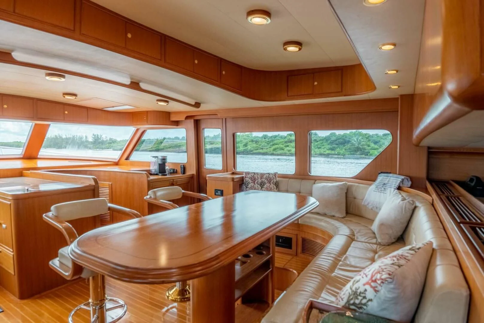 a living room with a couch and a table aboard SOMEDAY CAME Yacht for Sale