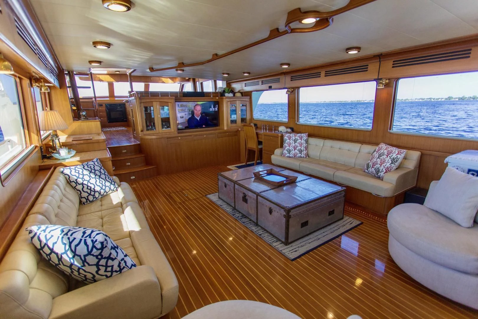 a living room with a large window aboard SOMEDAY CAME Yacht for Sale