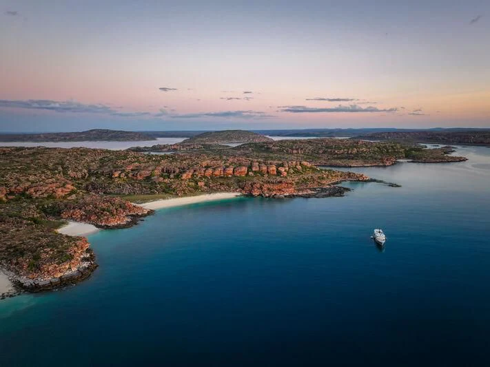 a body of water with land in the background aboard JUST B Yacht for Sale
