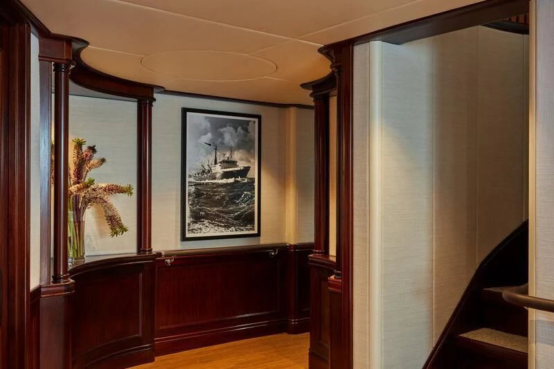 a room with a painting on the wall aboard JUST B Yacht for Sale