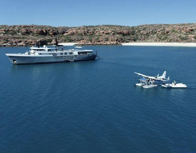 a couple of boats in the water aboard JUST B Yacht for Sale