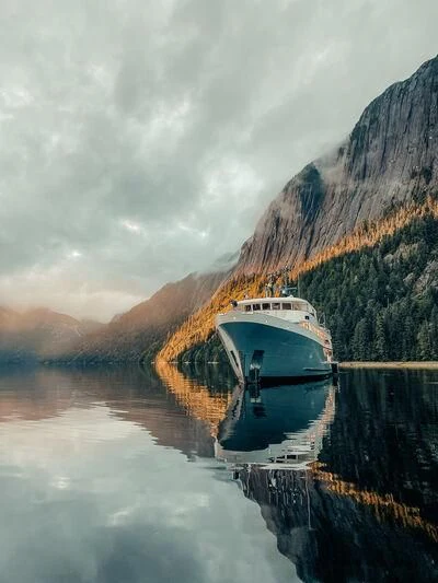 a boat on a lake aboard JUST B Yacht for Sale
