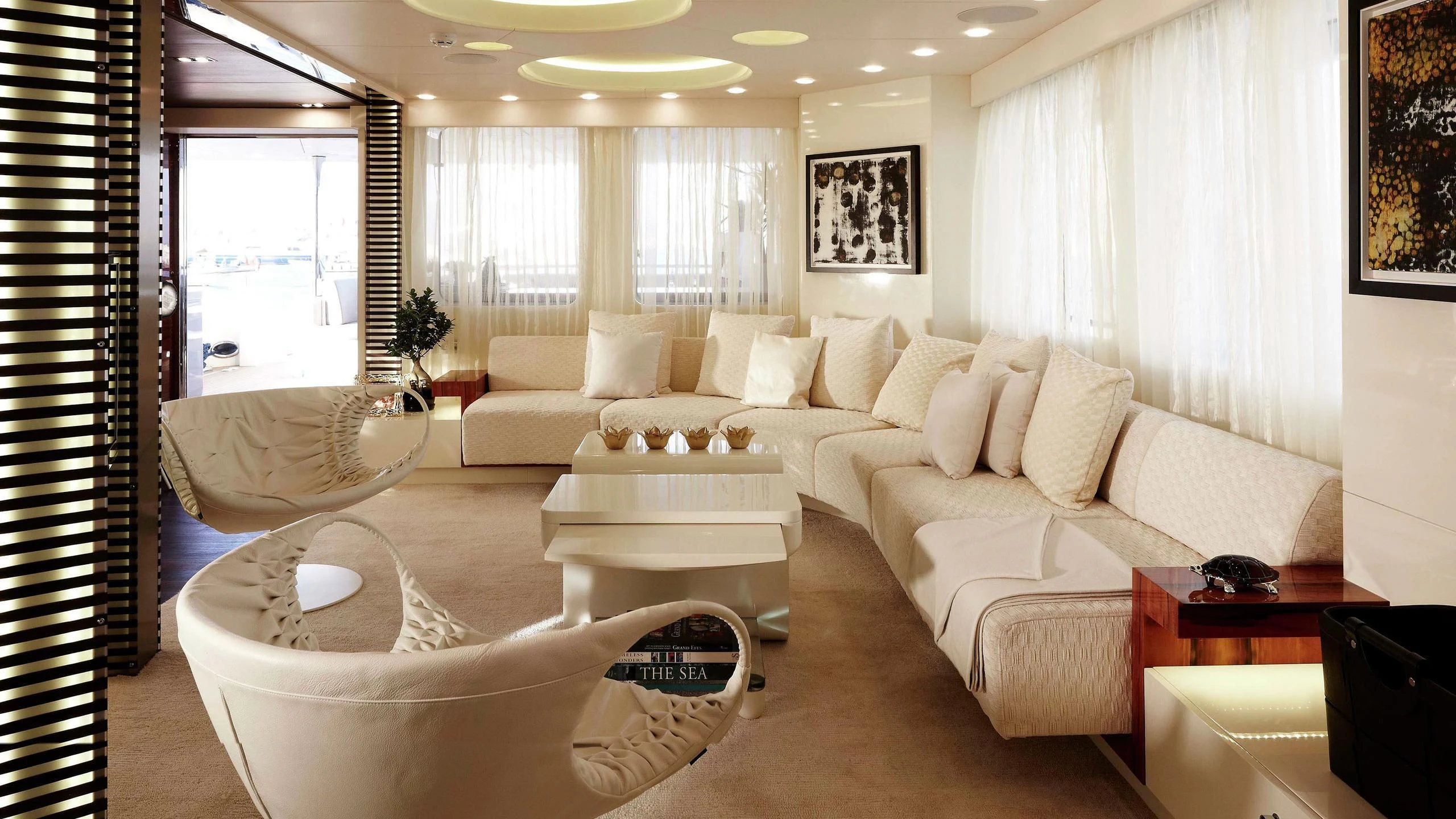 a living room with a large window aboard E&E Yacht for Sale