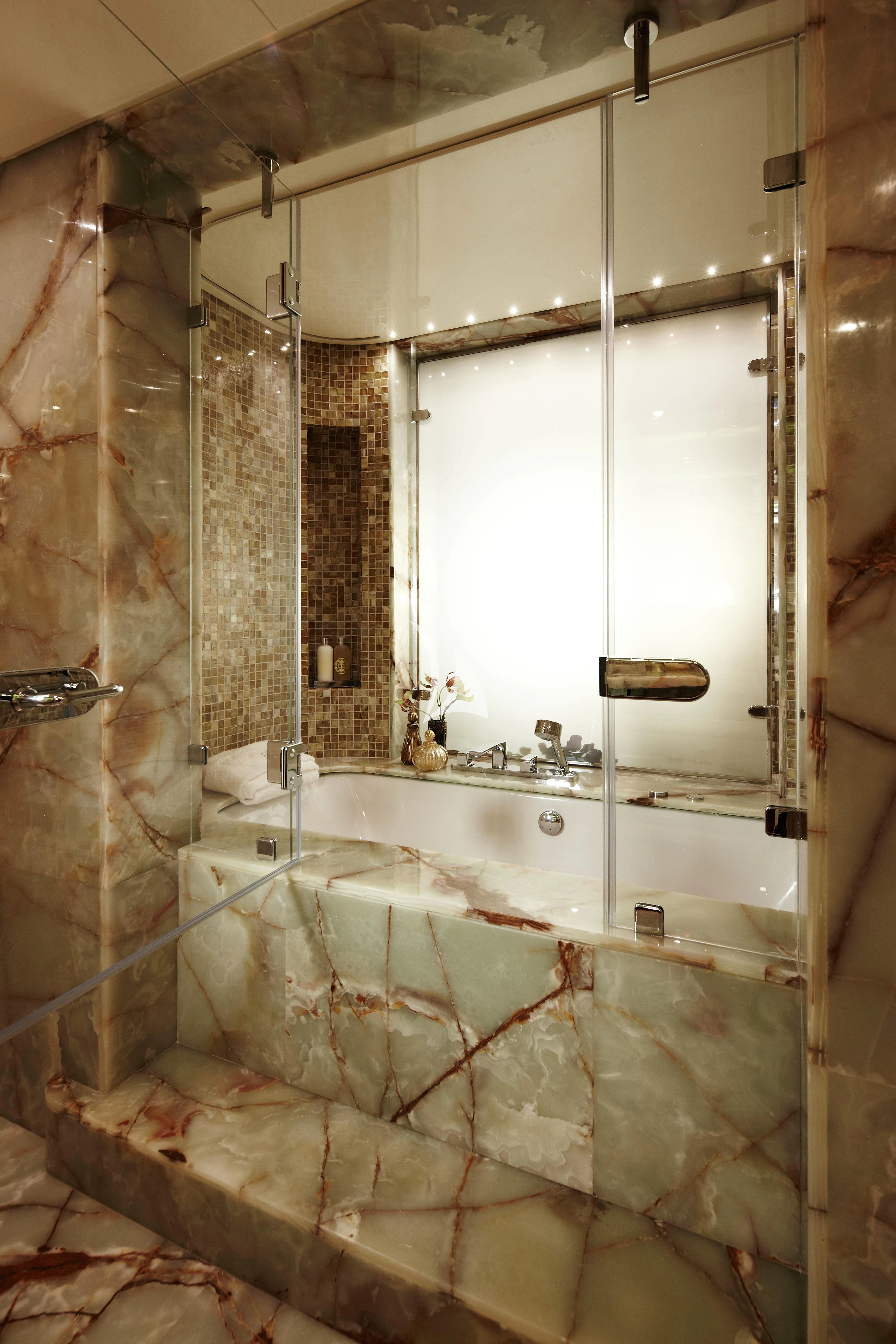 a bathroom with a large tub aboard E&E Yacht for Sale