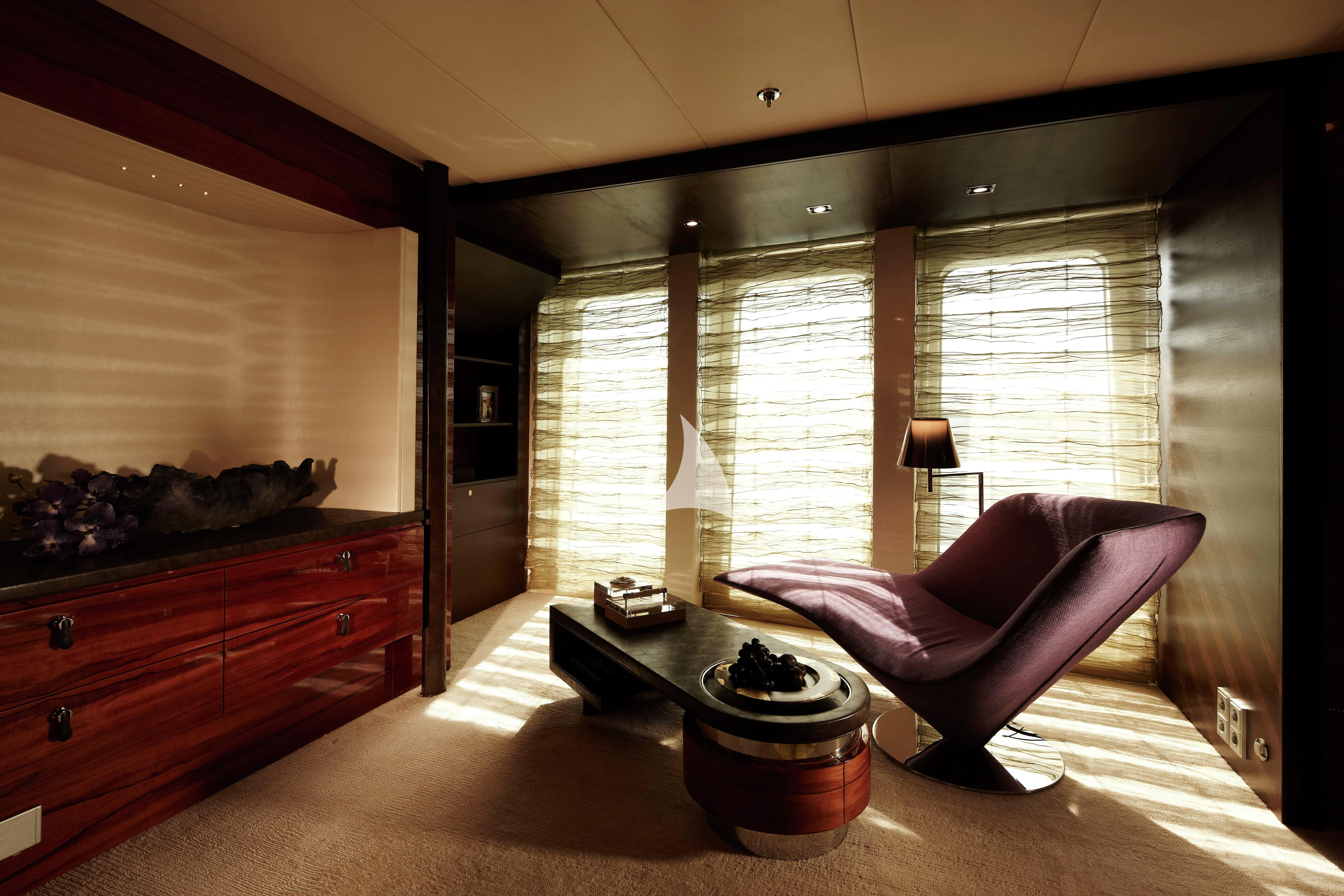 a living room with a couch and a coffee table aboard E&E Yacht for Sale