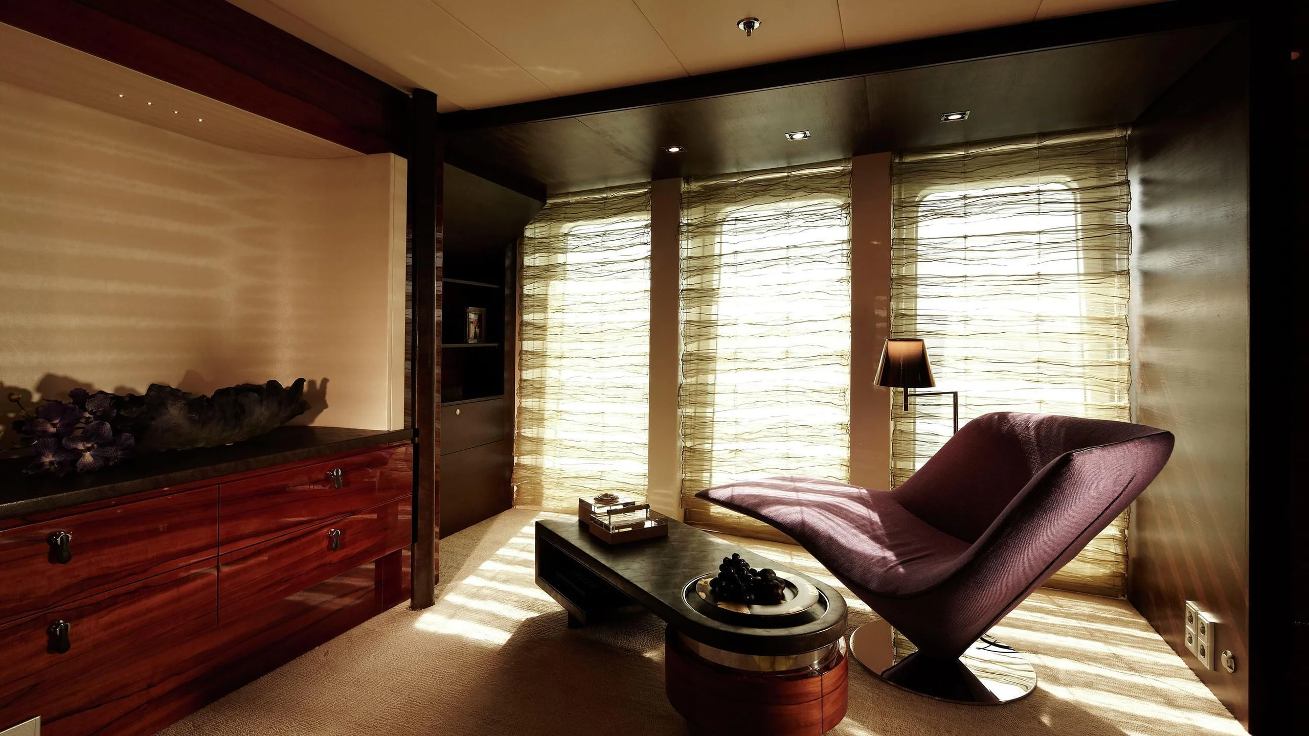 a living room with a couch and a table aboard E&E Yacht for Sale