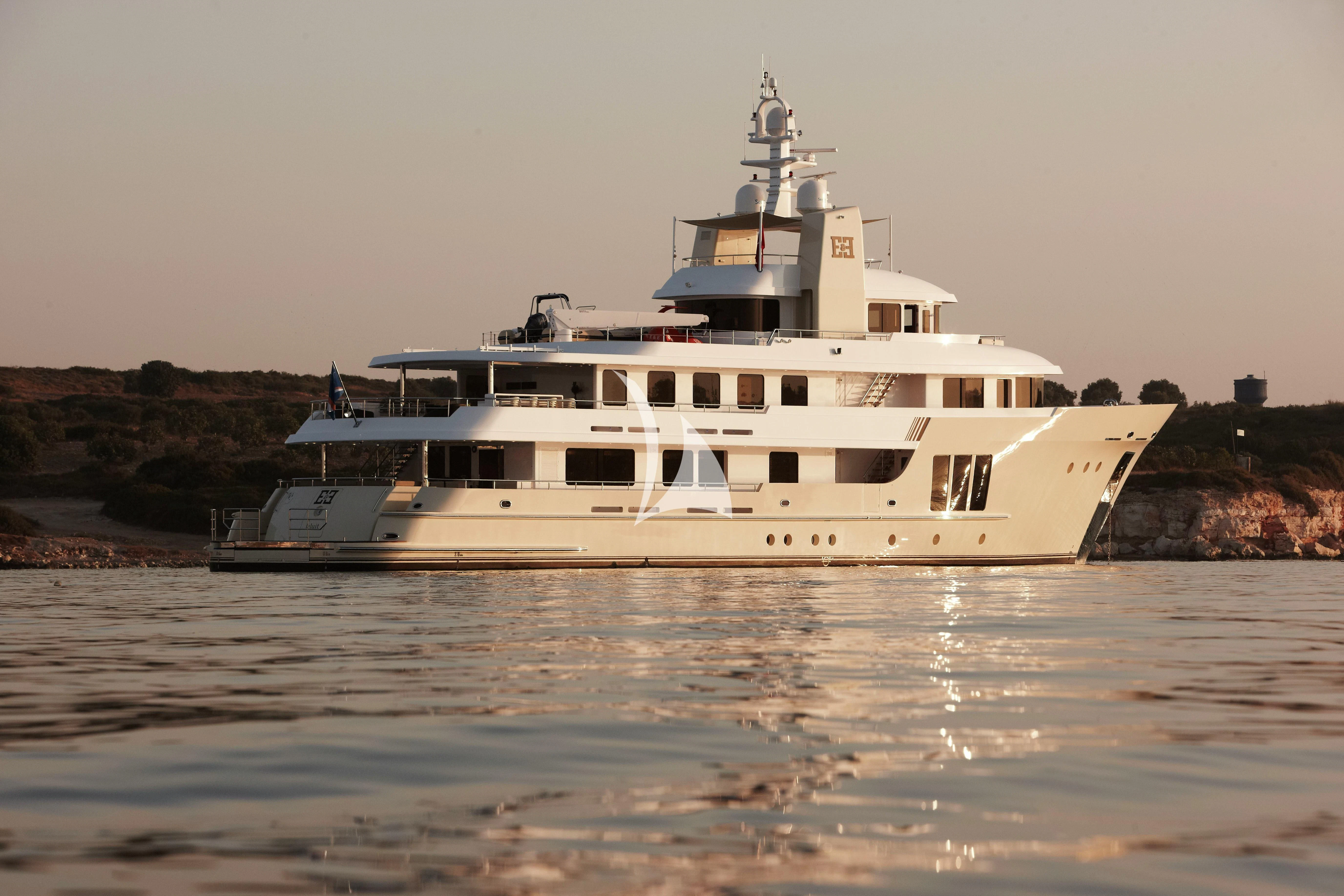 a white boat in the water aboard E&E Yacht for Sale