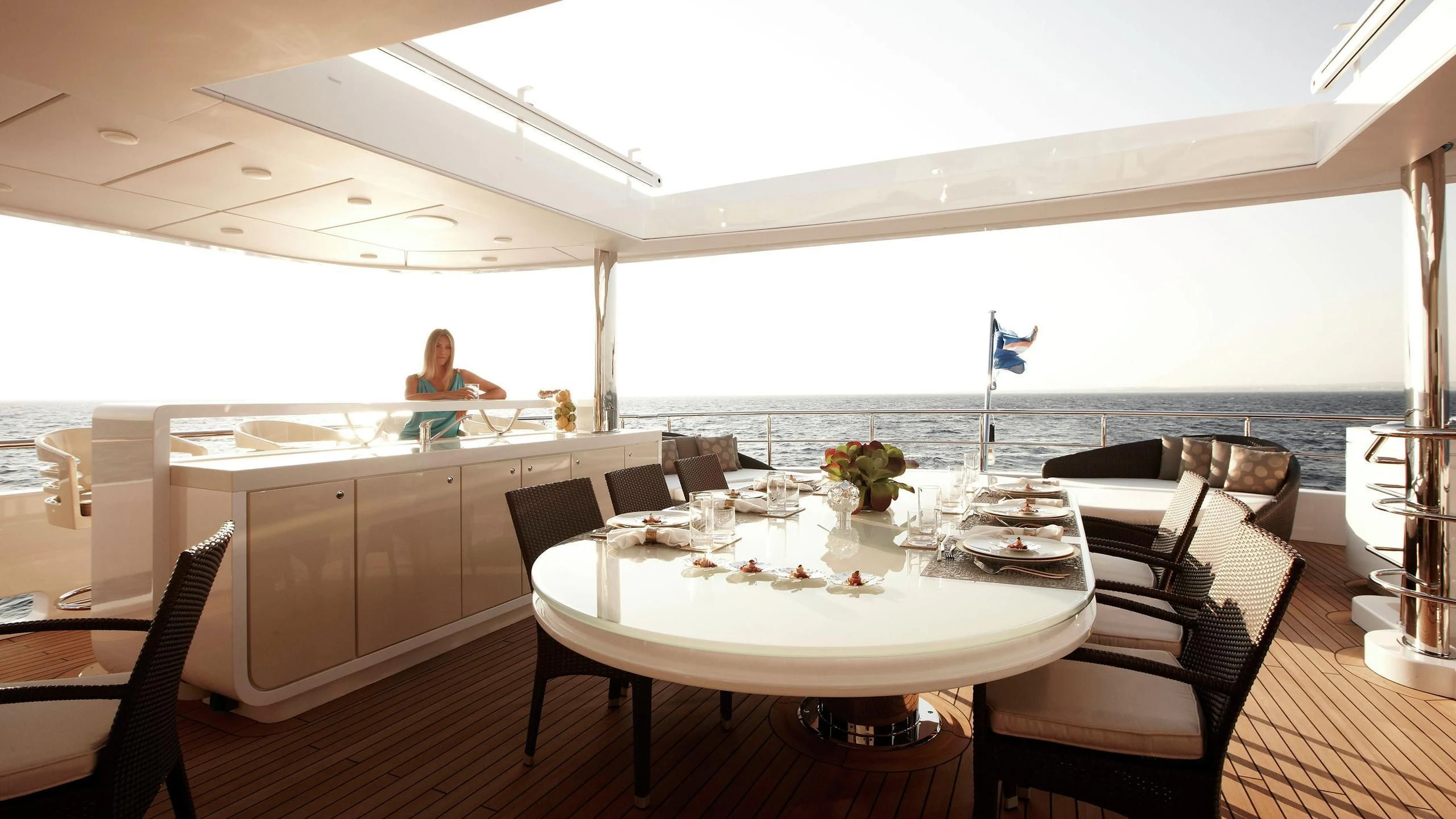 a person sitting at a table aboard E&E Yacht for Sale