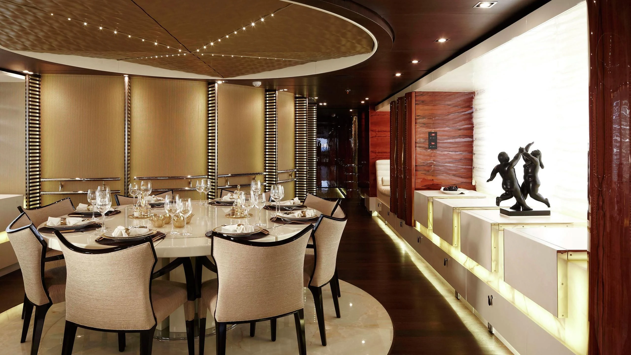 a dining room with a table and chairs aboard E&E Yacht for Sale