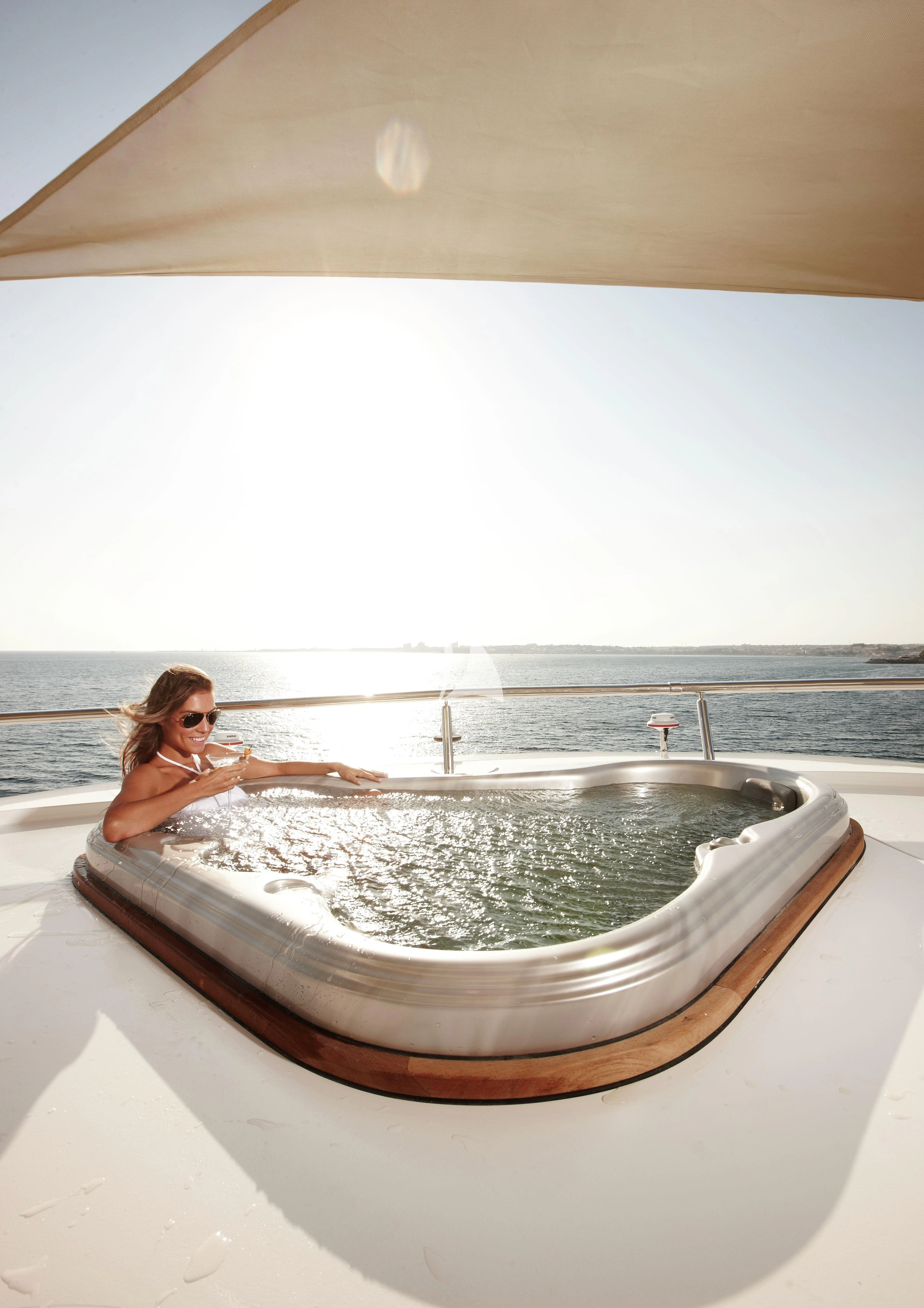 a person sitting in a bathtub aboard E&E Yacht for Sale