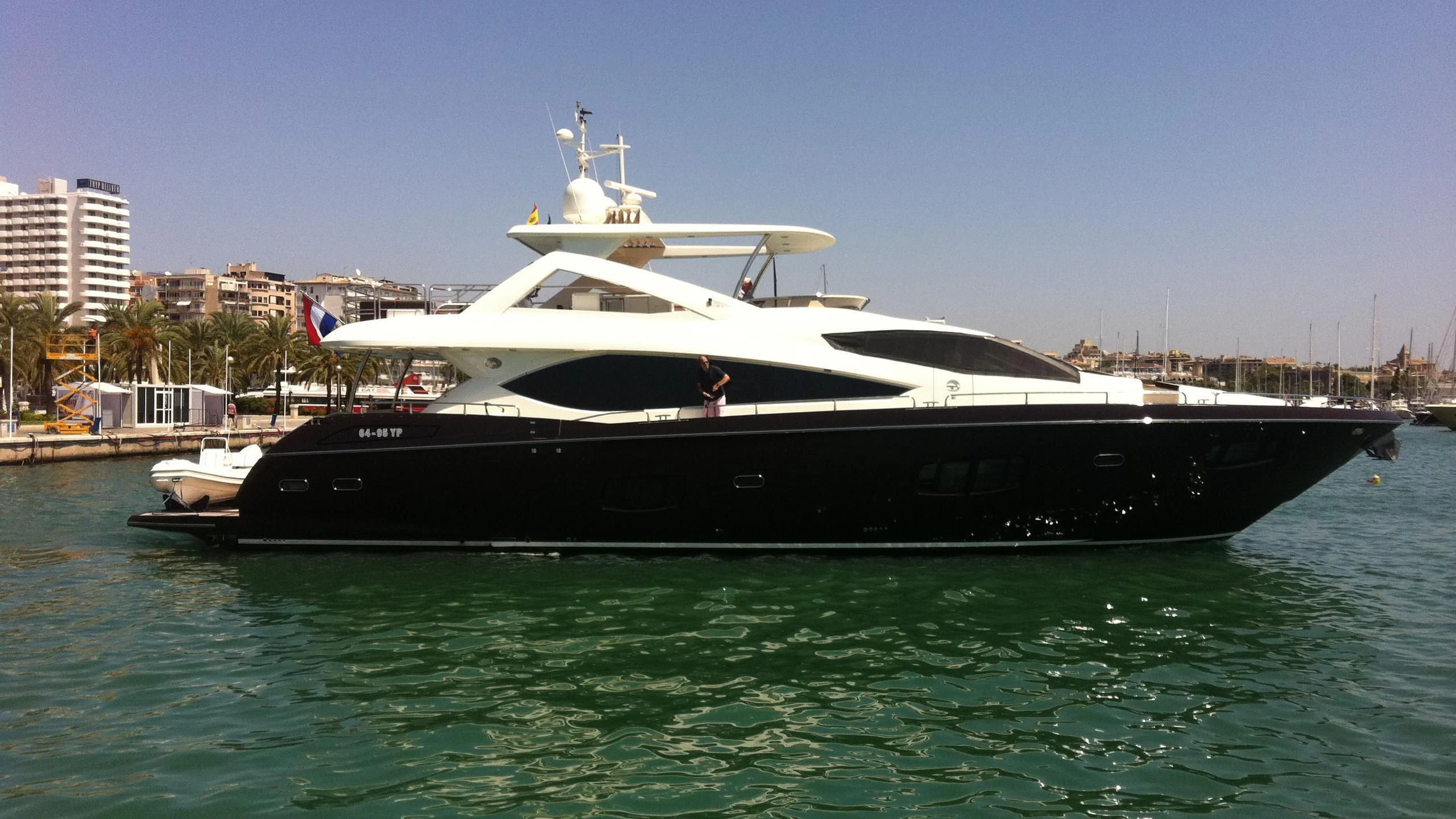 a large black and white boat aboard E&E Yacht for Sale