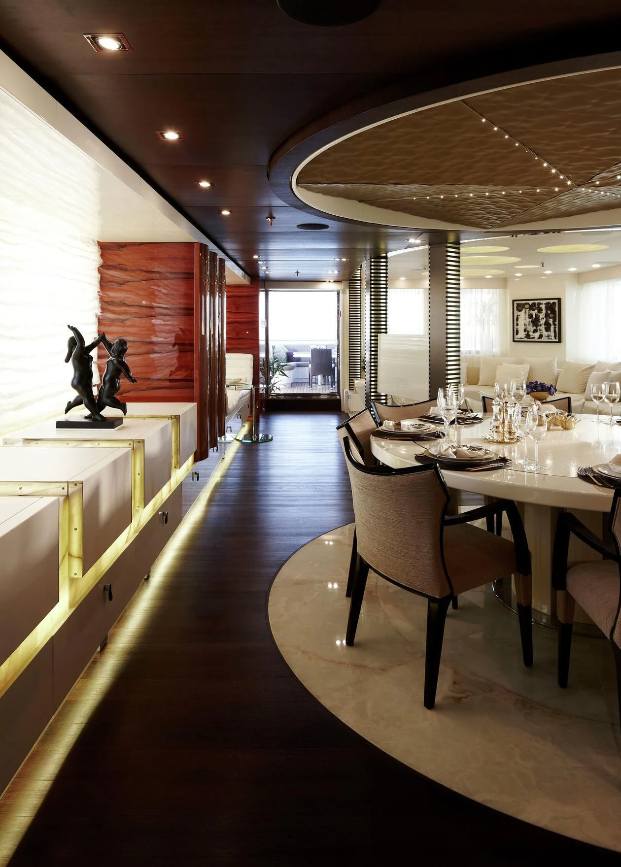 a room with a table and chairs aboard E&E Yacht for Sale