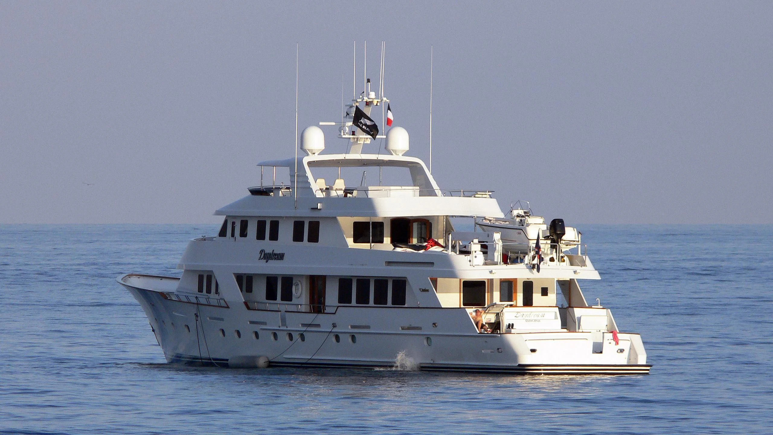 a large white boat in the water aboard DAYDREAM Yacht for Sale