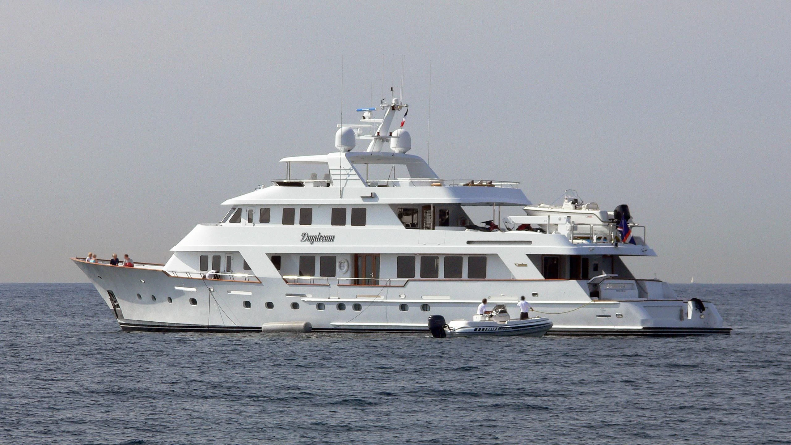 a large white yacht aboard DAYDREAM Yacht for Sale
