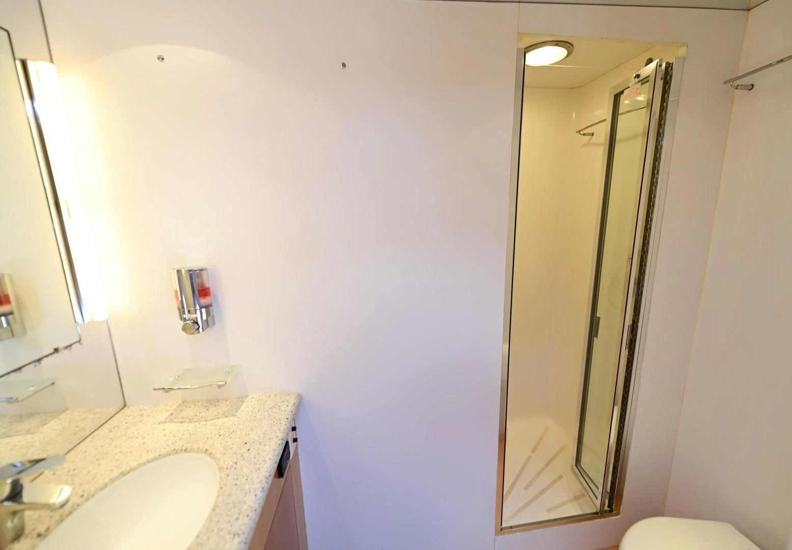 a bathroom with a sink and a mirror aboard MAHA Yacht for Sale