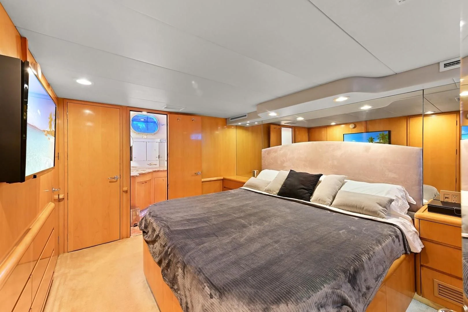 a bed in a room aboard MAHA Yacht for Sale