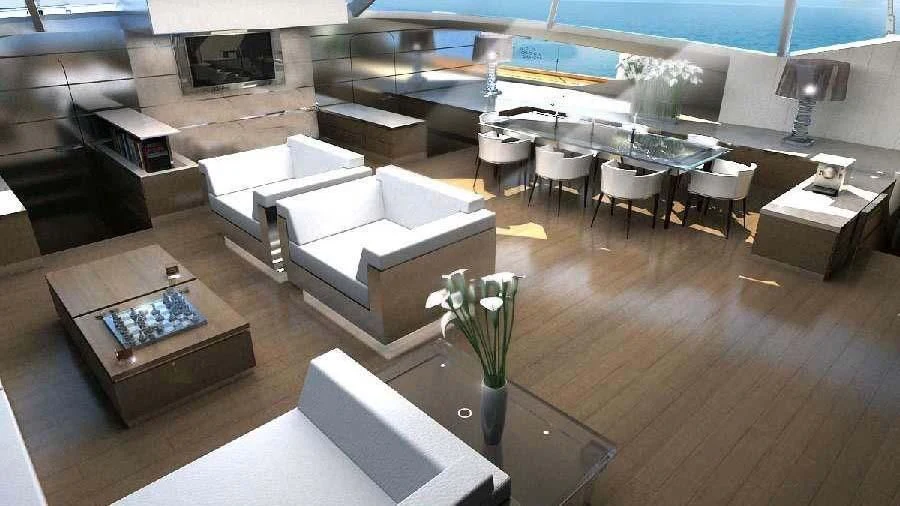 a room with a couch and a table and chairs aboard ESPIRITU DEL XAREY Yacht for Sale