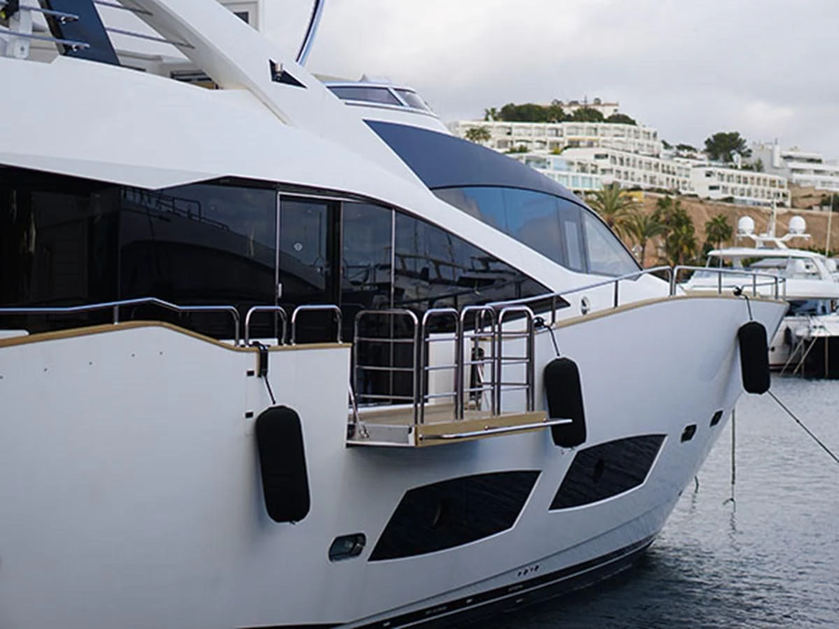 a white yacht on the water aboard 28M Yacht for Sale