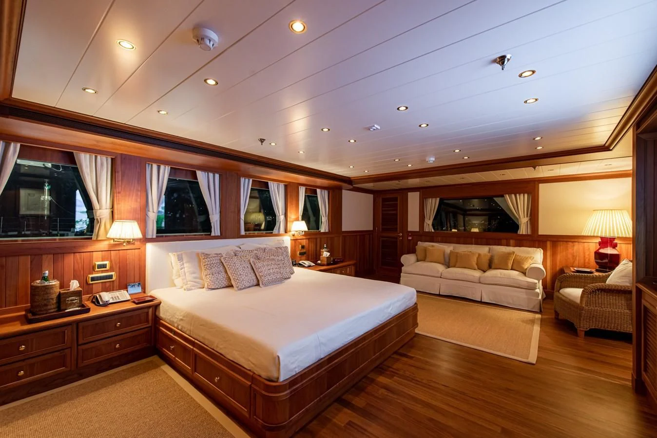 a large bedroom with a large bed aboard BLEU DE NIMES Yacht for Charter