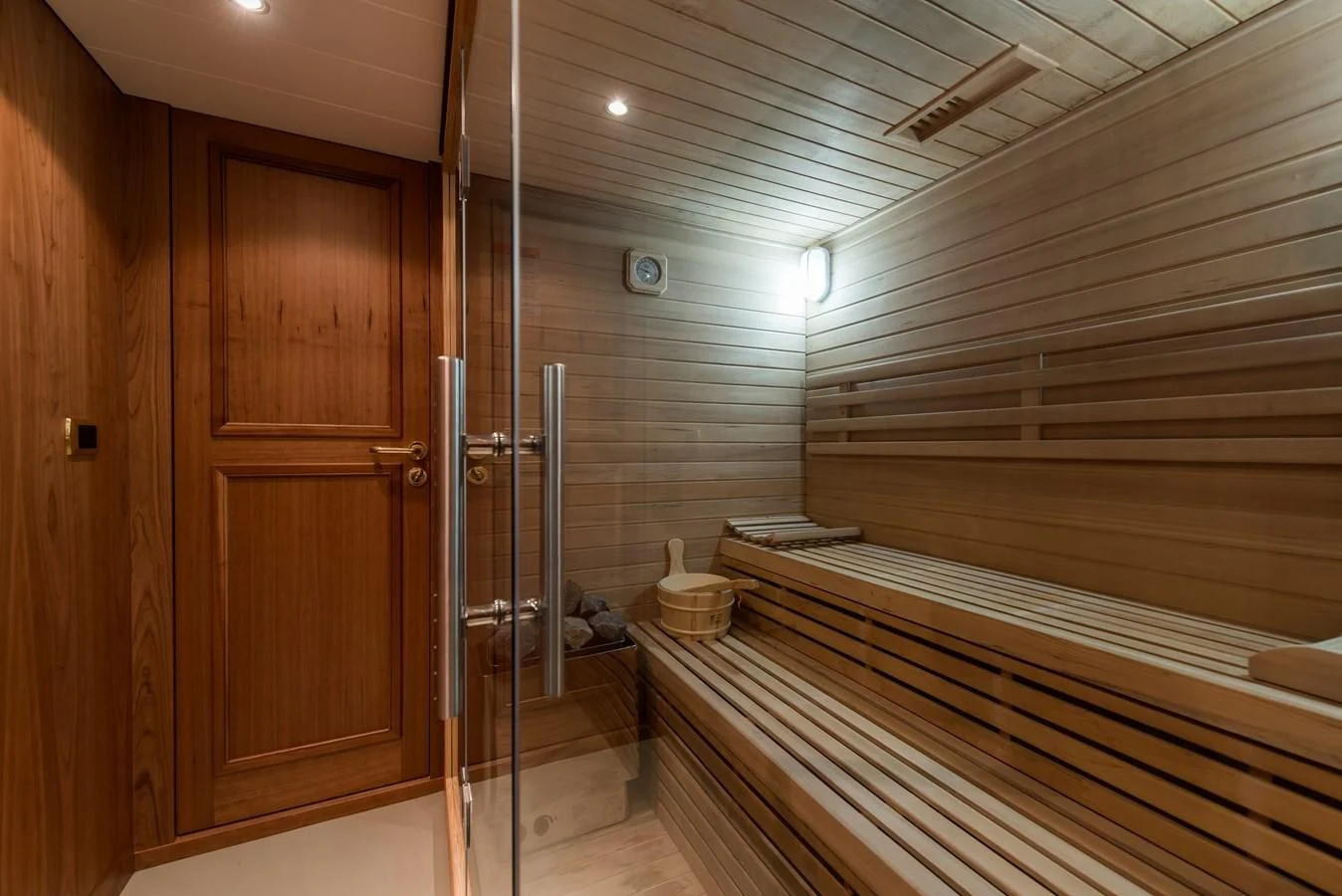 a wooden room with wooden walls aboard BLEU DE NIMES Yacht for Charter