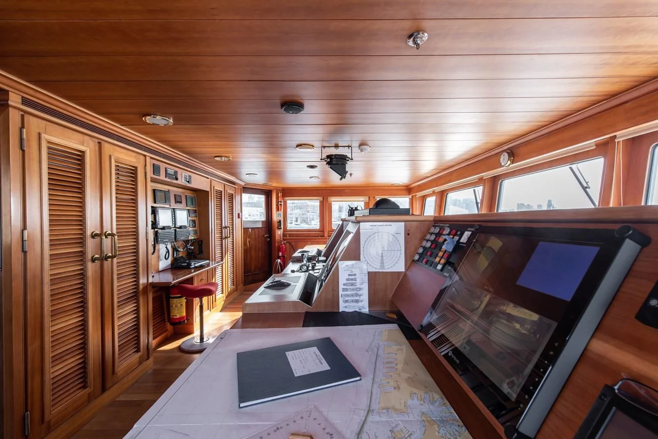 a room with a computer and a desk aboard BLEU DE NIMES Yacht for Charter