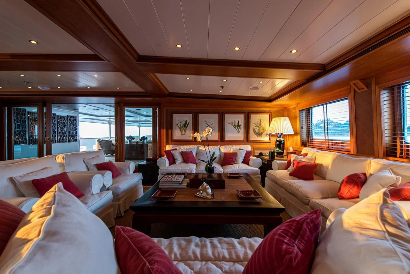 a living room with a large window aboard BLEU DE NIMES Yacht for Charter