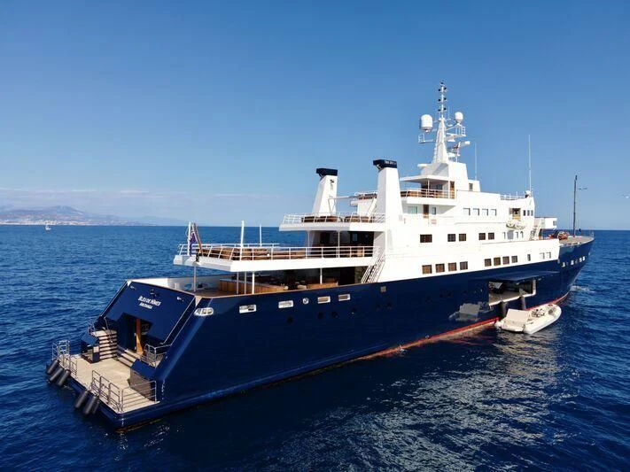 a large ship in the water aboard BLEU DE NIMES Yacht for Charter