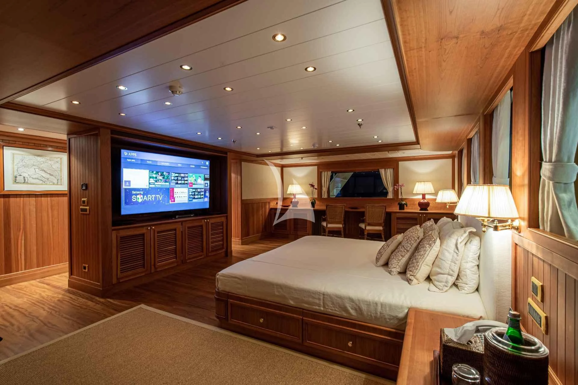 a bedroom with a large bed aboard BLEU DE NIMES Yacht for Charter