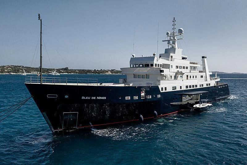 a large ship in the water aboard BLEU DE NIMES Yacht for Charter