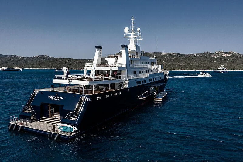a large boat in the water aboard BLEU DE NIMES Yacht for Charter