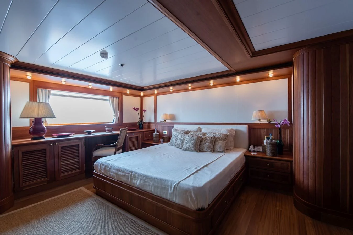 a bed in a room aboard BLEU DE NIMES Yacht for Charter