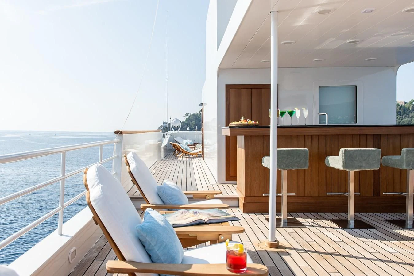 a room with a table and chairs aboard BLEU DE NIMES Yacht for Charter