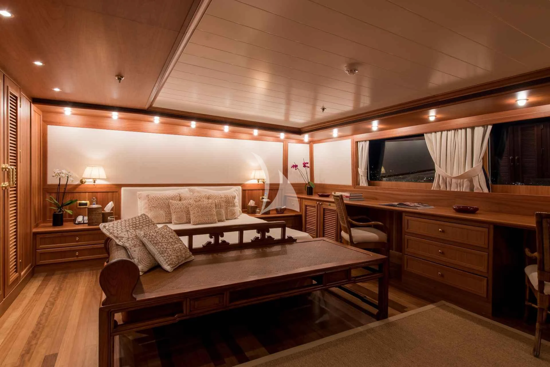 a room with a table and chairs aboard BLEU DE NIMES Yacht for Charter