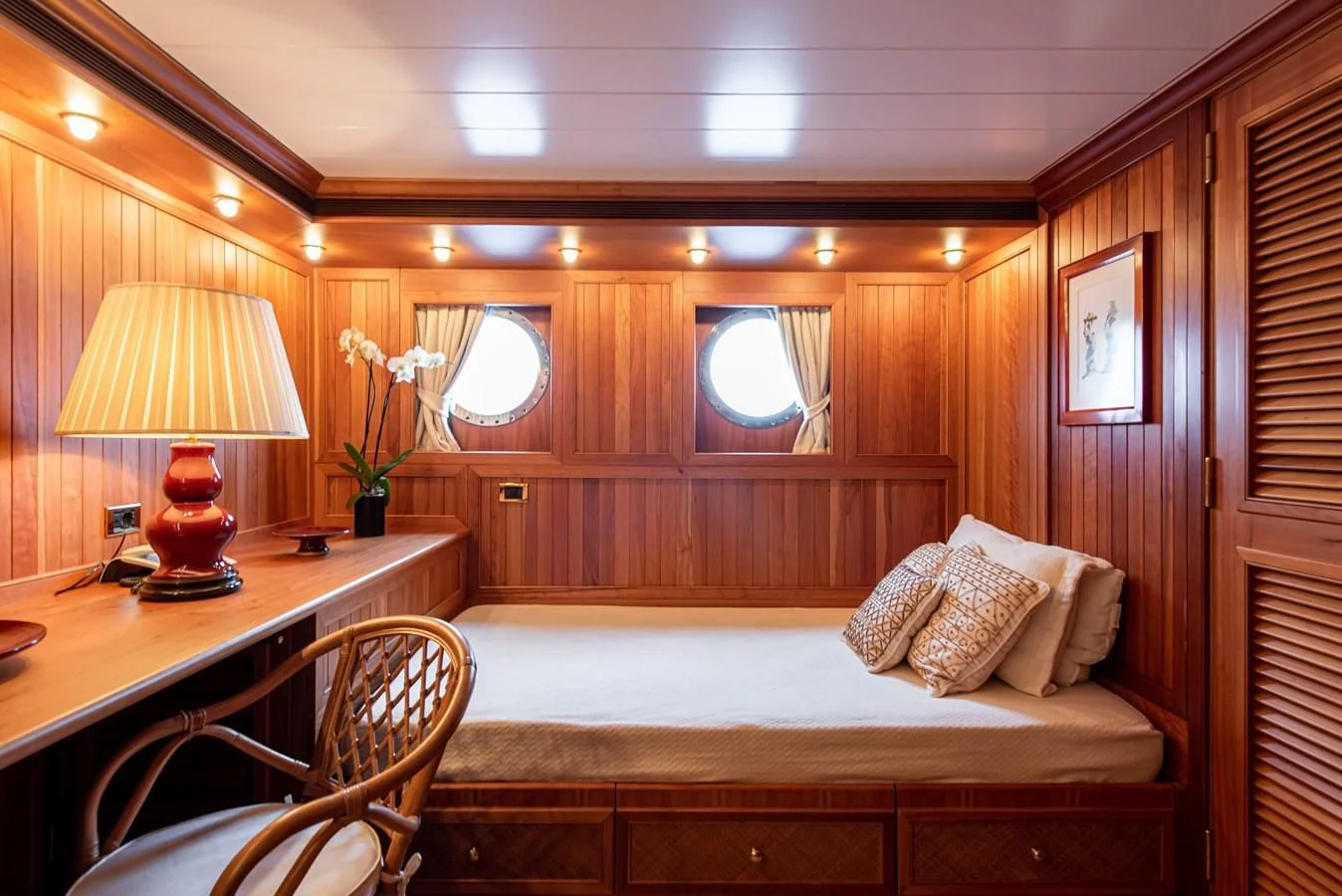 a bed in a room aboard BLEU DE NIMES Yacht for Charter