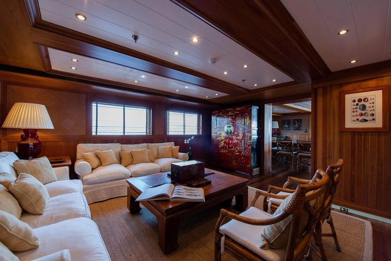 a living room with a large window aboard BLEU DE NIMES Yacht for Charter