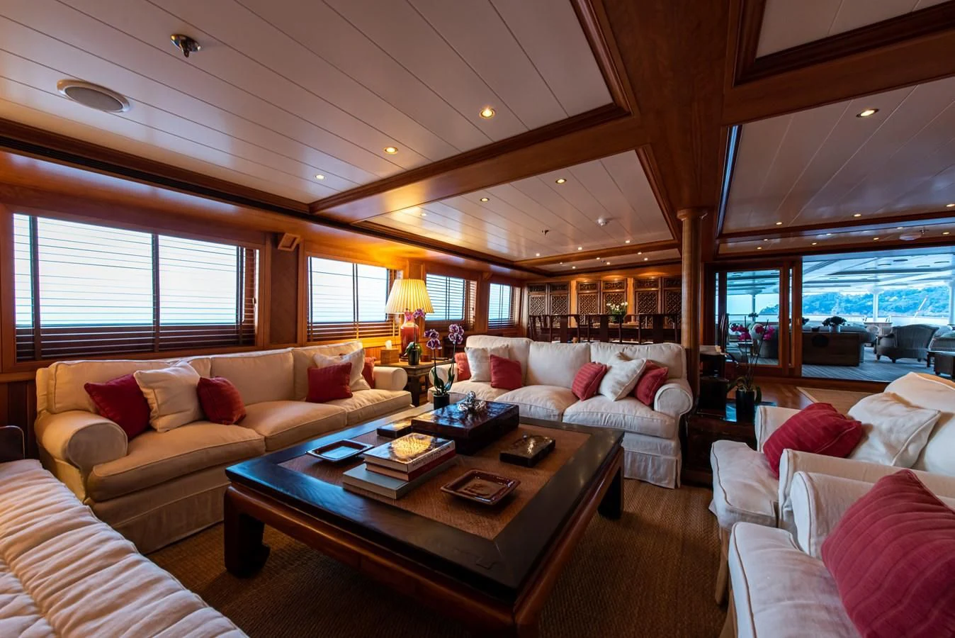 a living room with a large window aboard BLEU DE NIMES Yacht for Charter